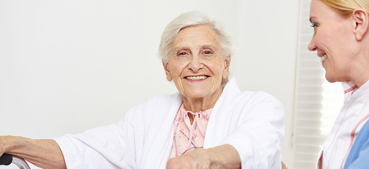Slide Image of an elderly lady with nurse