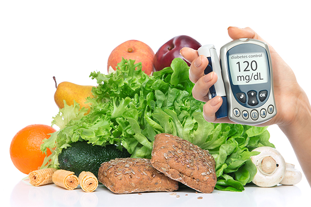 Image of health food and a diabetes monitiring device
